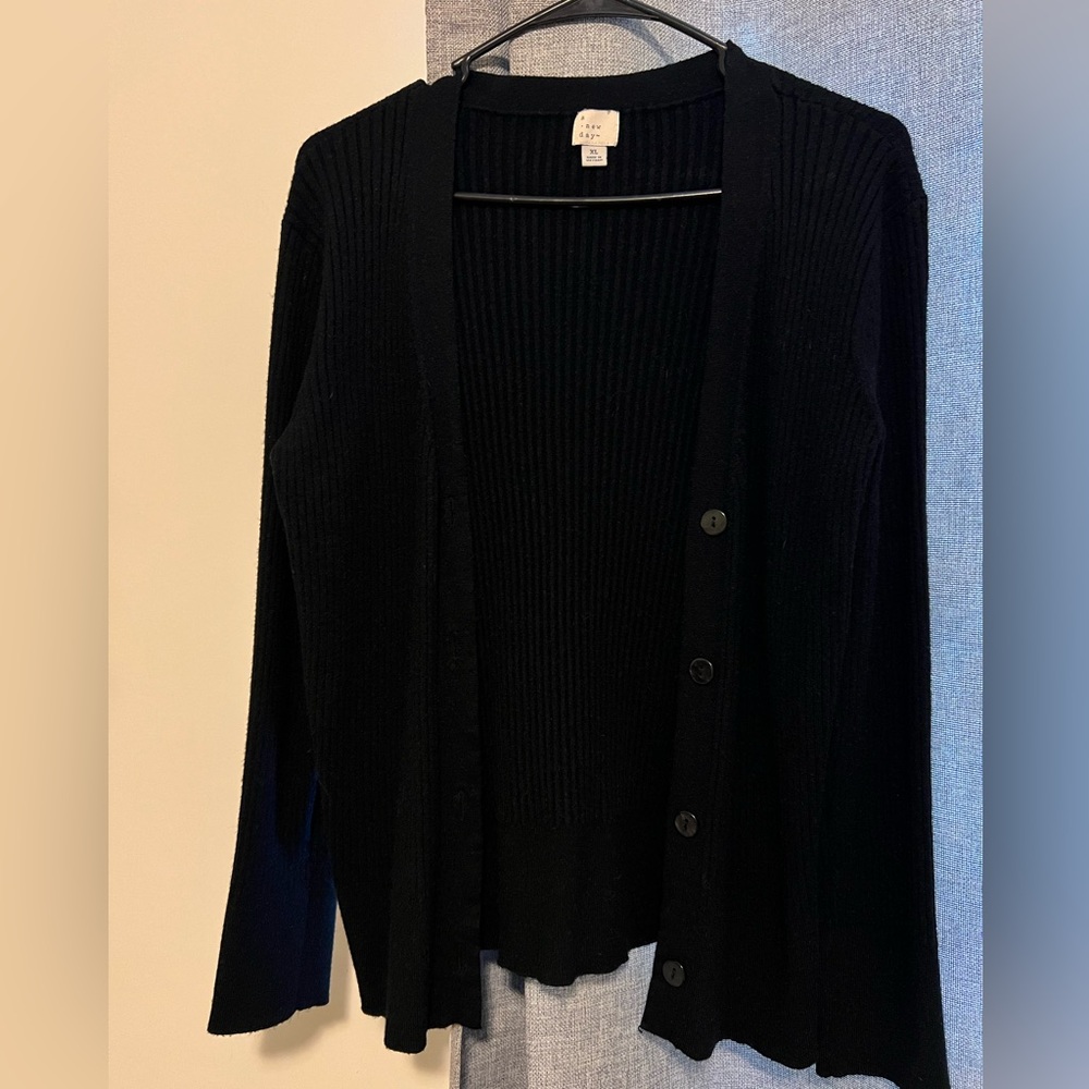 Black “a new day” cardigan